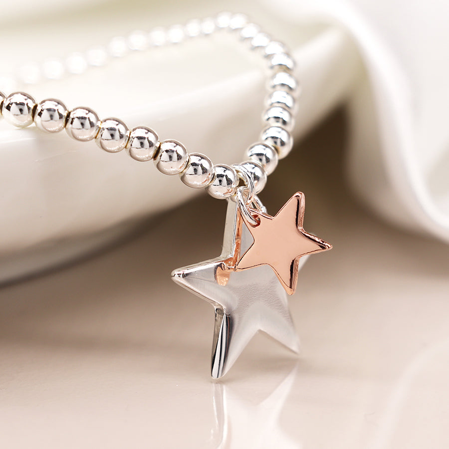 Silver plated and rose gold double star charm bracelet