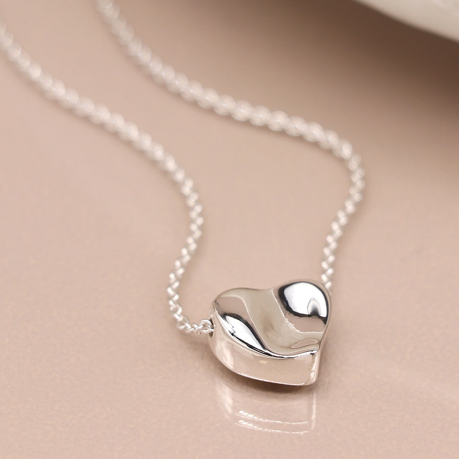 Silver plated wavy surface heart necklace