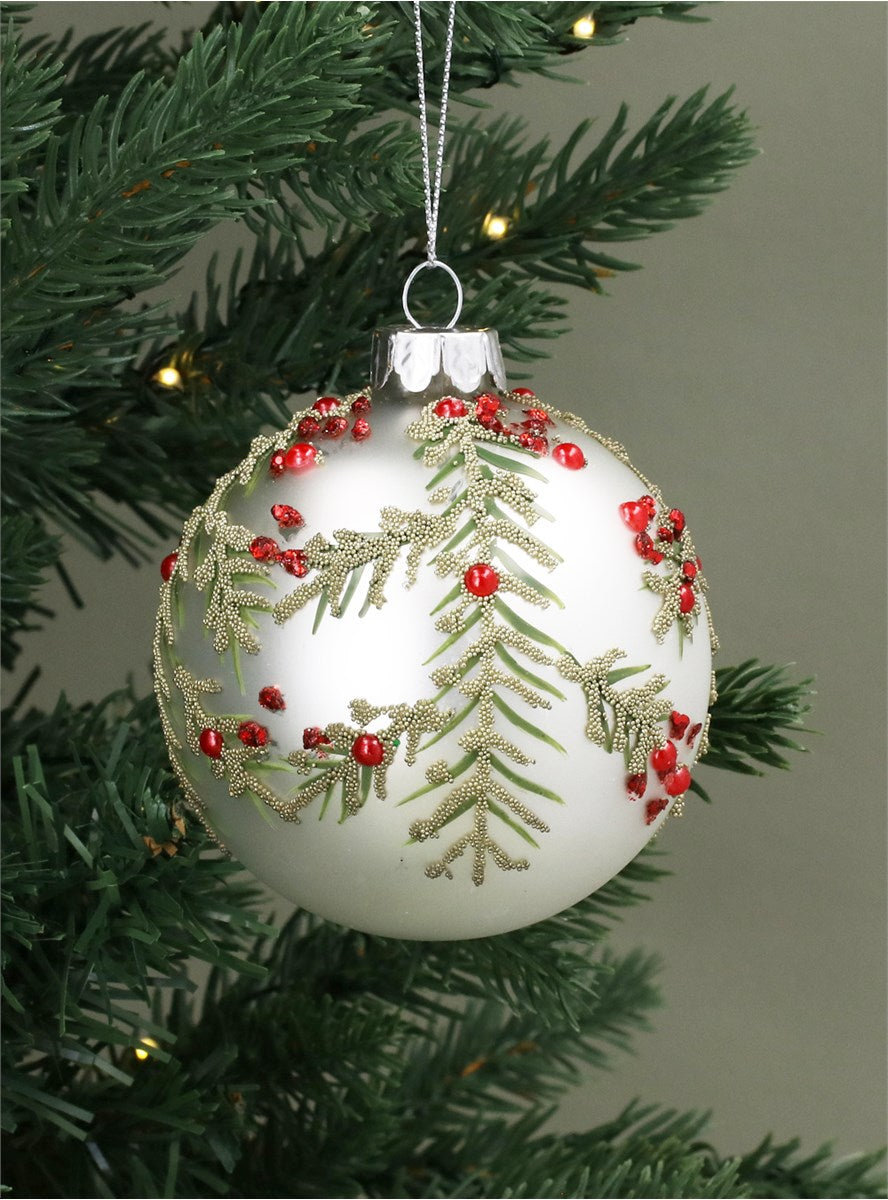 White glass bauble with red berry spray