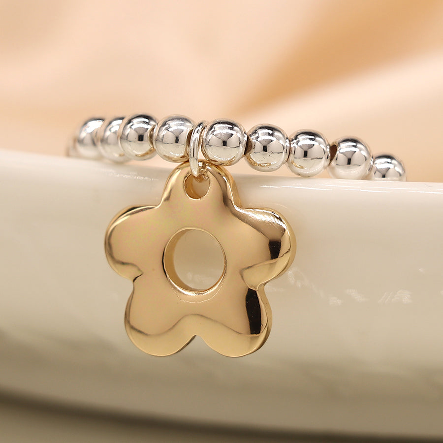 Silver plated and faux gold retro daisy charm bracelet