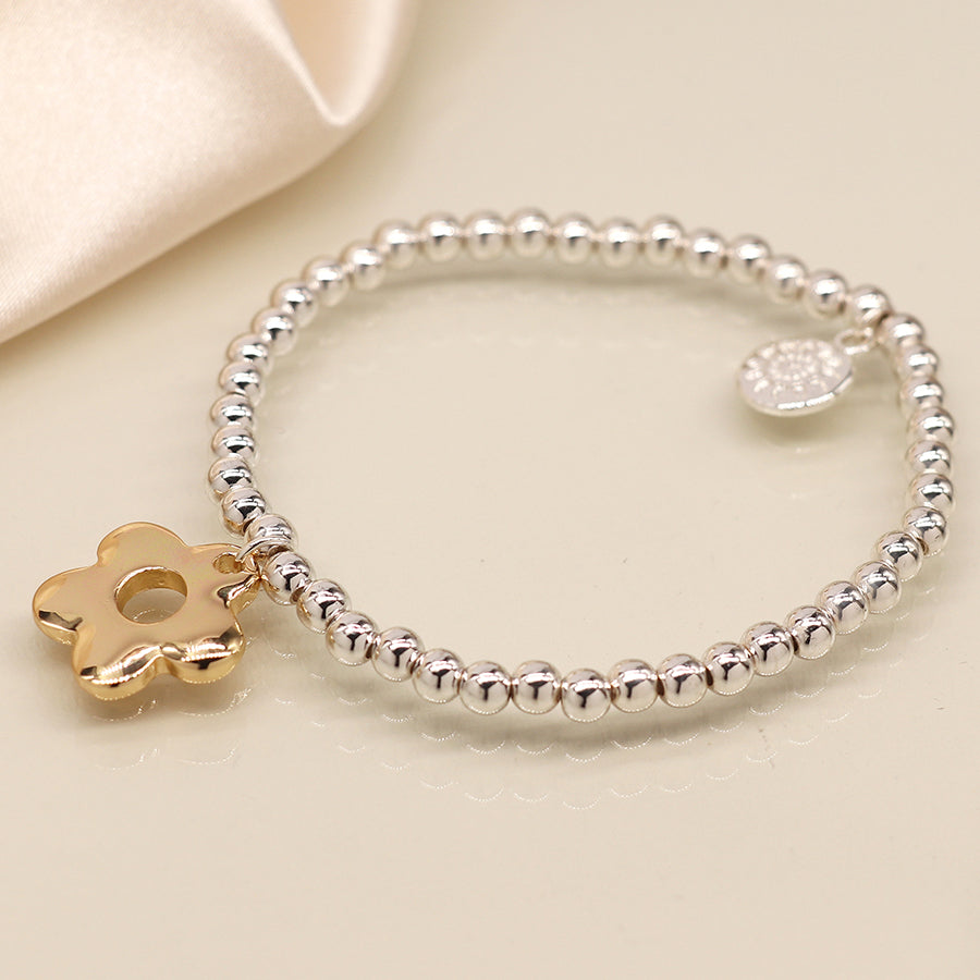 Silver plated and faux gold retro daisy charm bracelet