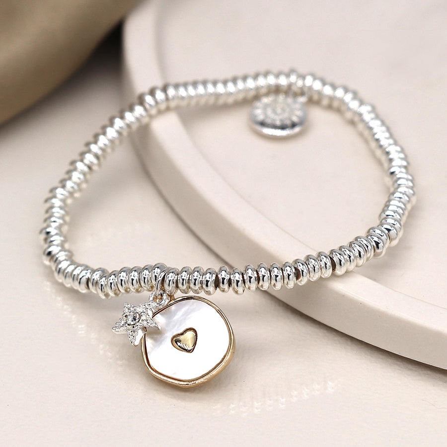 Silver plated mop heart disc and crystal star bracelet