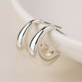 Silver plated smooth curve earrings