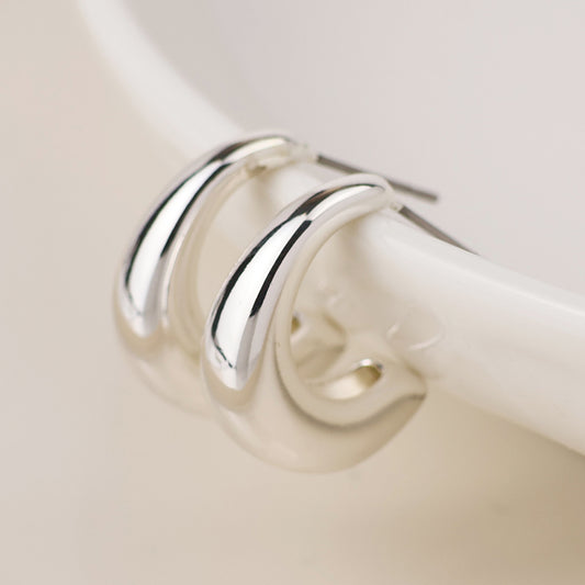 Silver plated smooth curve earrings