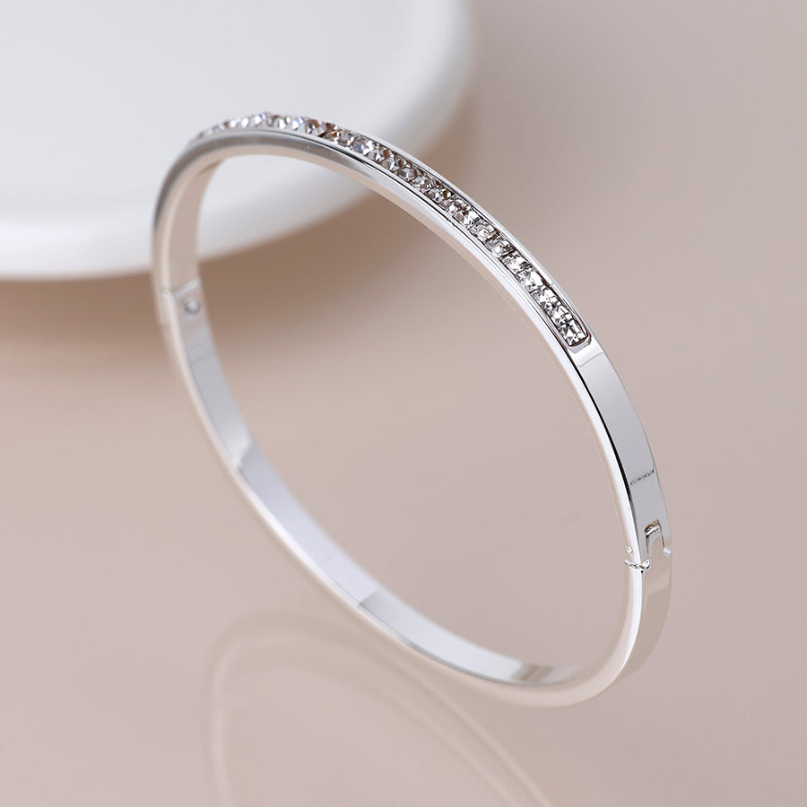 Silver plated clear crystals hinged bangle