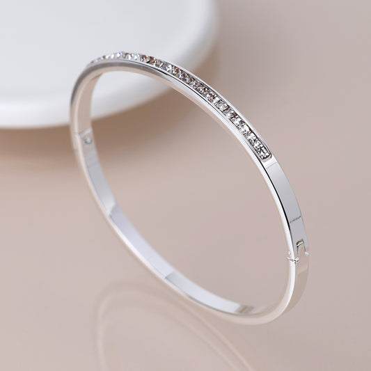 Silver plated clear crystals hinged bangle