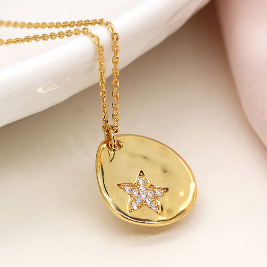 Faux gold organic polished teardrop necklace with crystal star imprint