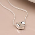 Silver plated wavy surface heart necklace
