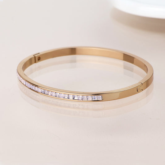 Golden pink crystals hinged bangle